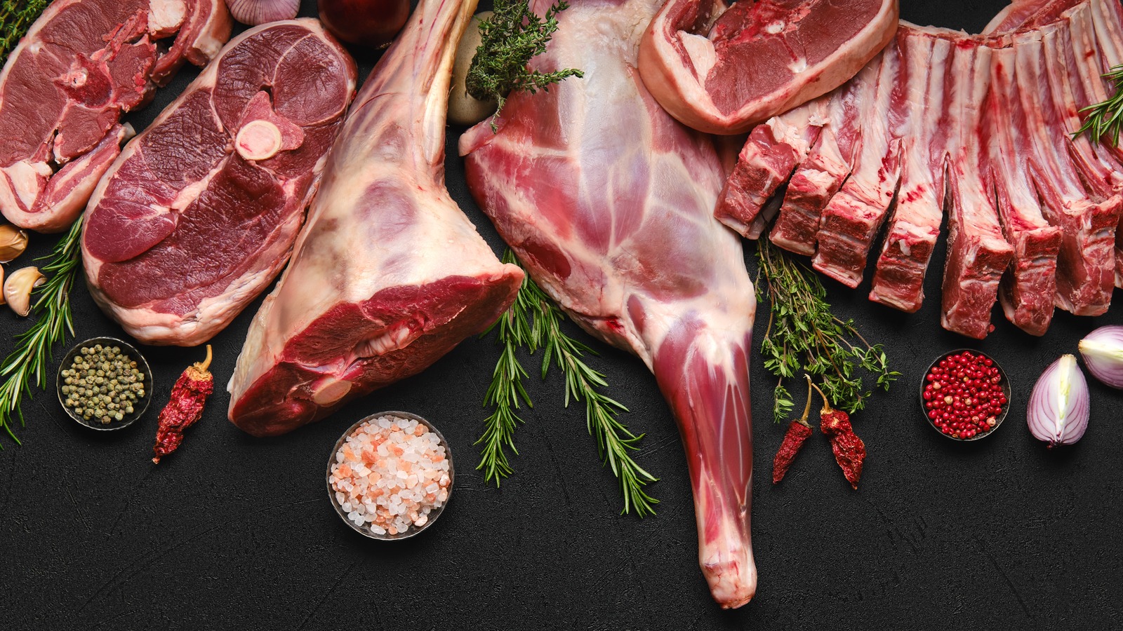 A flat-lay or banner-style image showing a variety of halal-certified fresh beef, lamb, and poultry cuts with a Dubai skyline or delivery branding overlay.